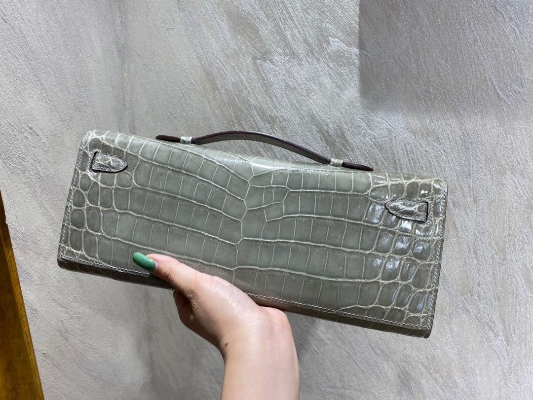 KELLY CUT 31 IN ASH GRAY SHINNY ALLIGATOR LEATHER WITH SILVER HARDWARE