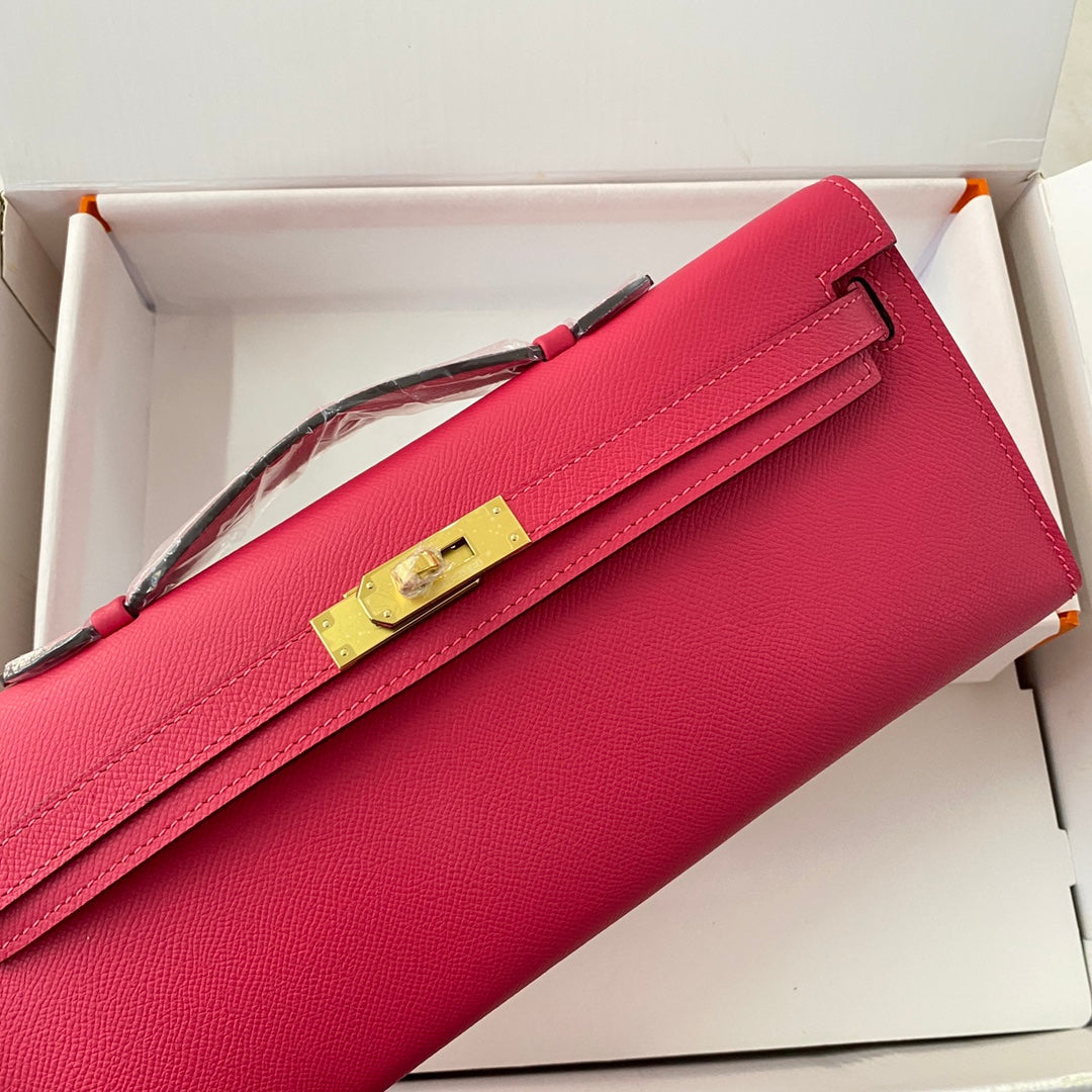KELLY CUT 31 IN CHERRY RED CALFSKIN WITH GOLD HARDWARE