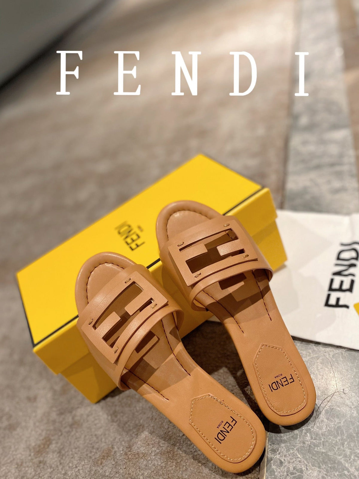 FENDI BAGUETTE SLIDES IN COPPER BROWN LAMBSKIN