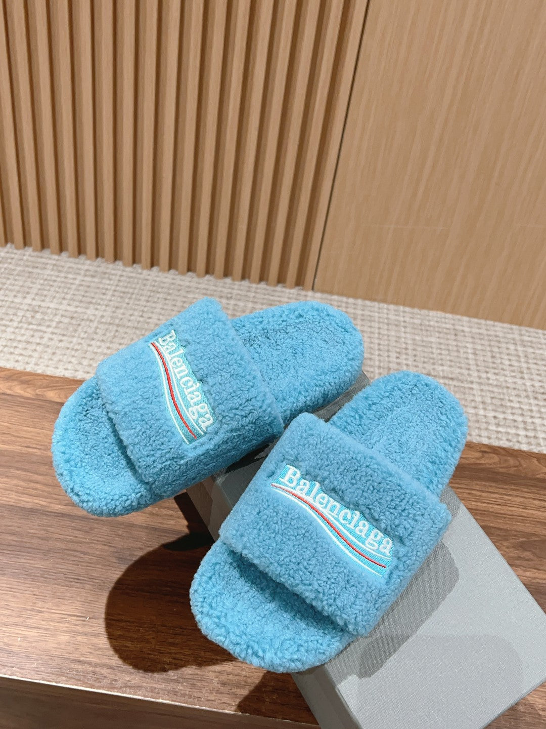 FURRY SLIDES IN SKY BLUE CURLY SHEARLING