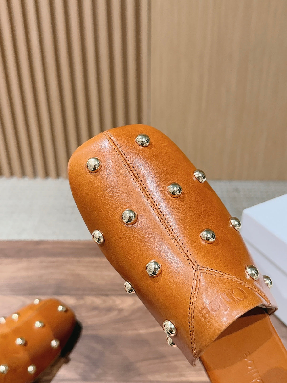 CHLOE 26S STUDDED FLAT MULES IN CARAMEL BROWN CALFSKIN