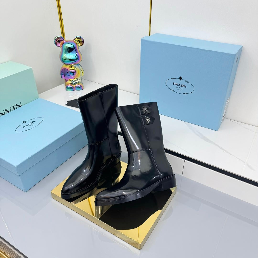 PRADA 25S BROOKLYN BOOTS 50MM IN BLACK GLOSSY CALFSKIN WITH LOGO