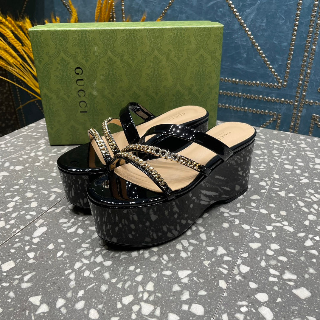 HIGH WEDGE PLATFORM IN BLACK CALFSKIN WITH GOLD HARDWARE