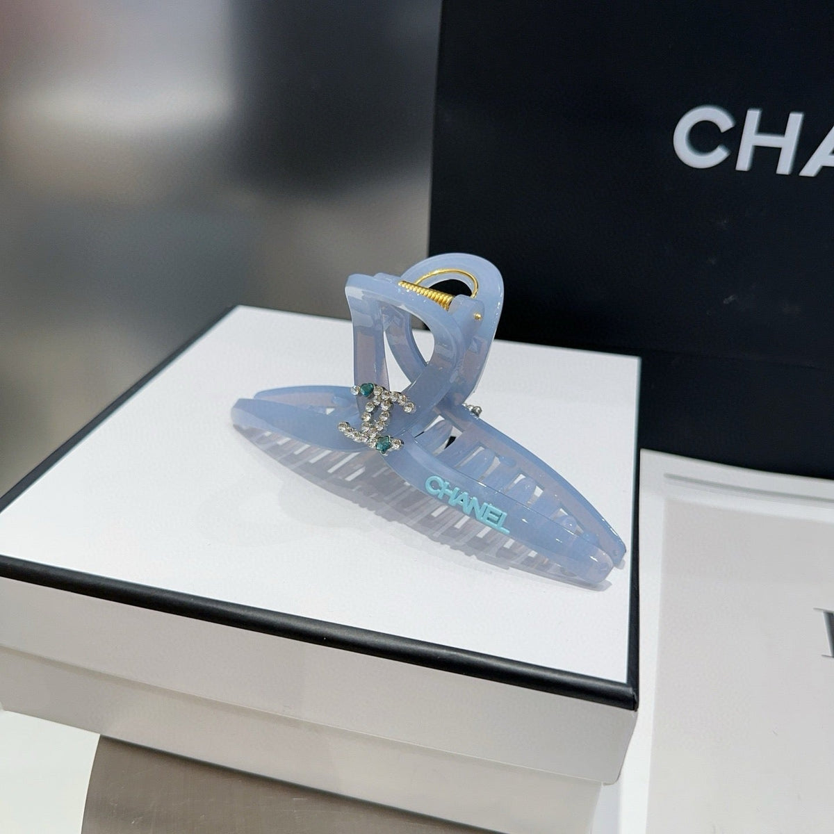CHANEL 26S HAIR CLIP IN LIGHT BLUE ACETATE 512096