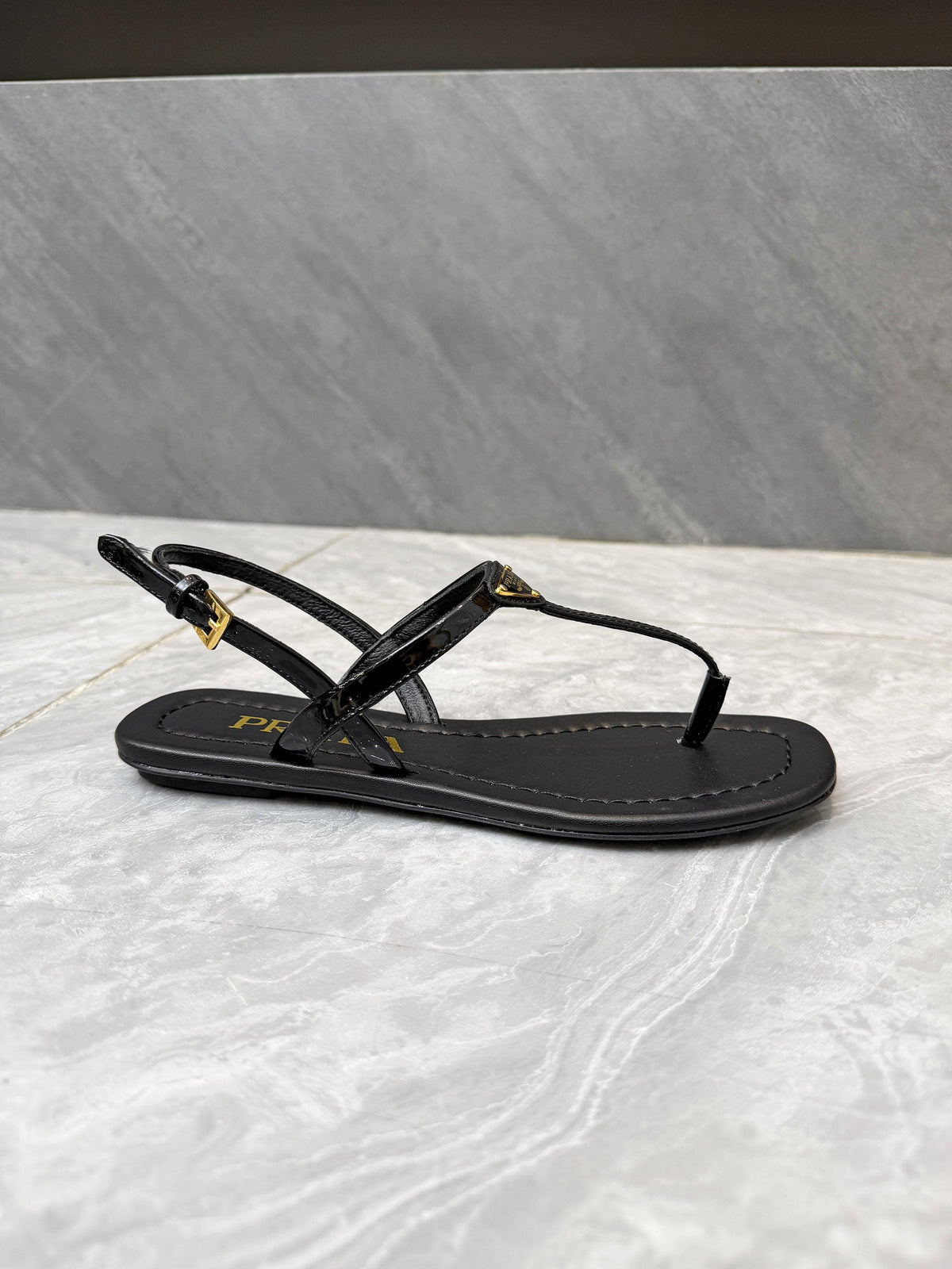 PRADA 26S THONG SANDALS IN BLACK CALFSKIN TRIANGLE LOGO