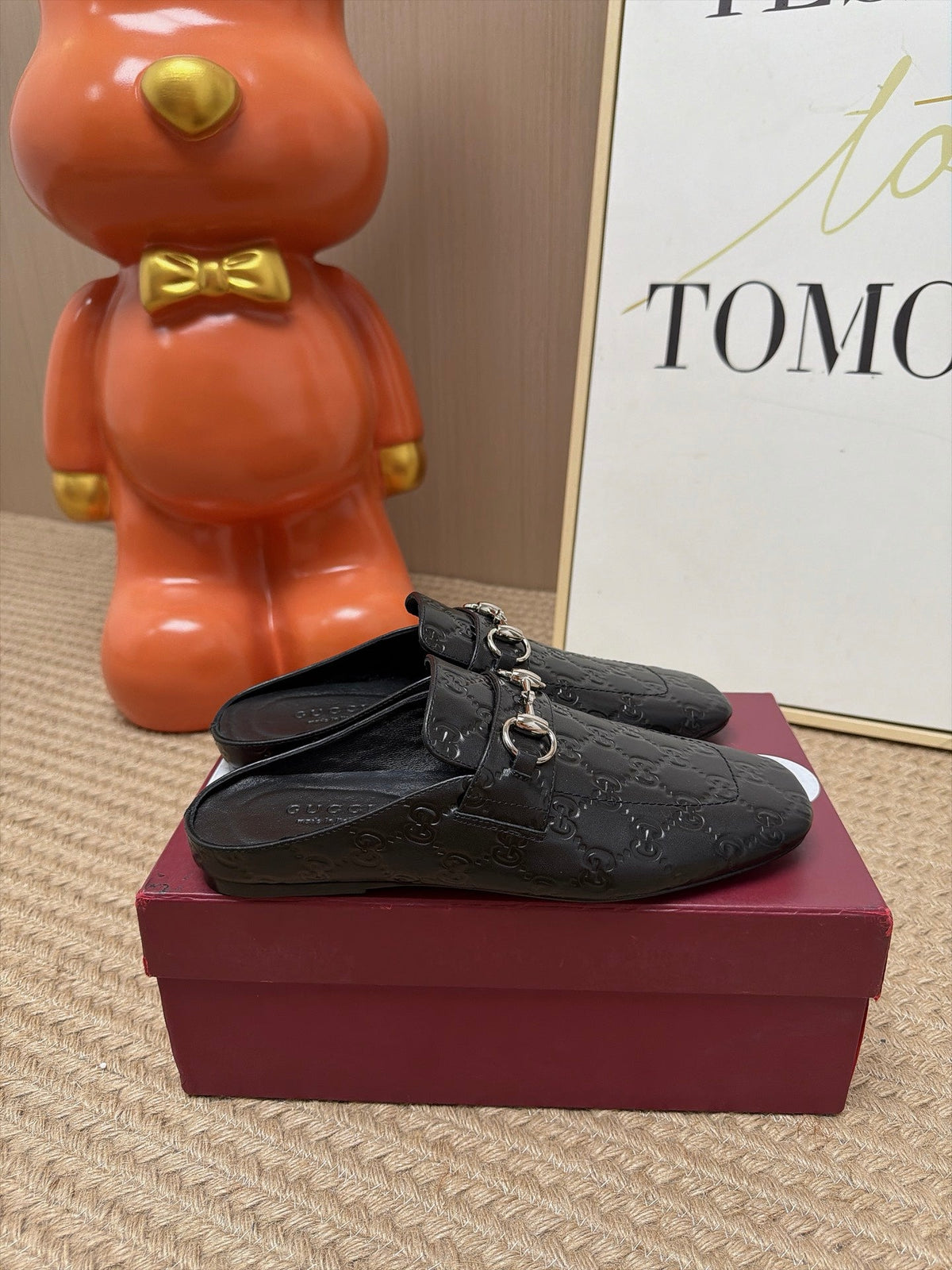GUCCI 26S FLAT MULES IN BLACK GG EMBOSSED LAMBSKIN