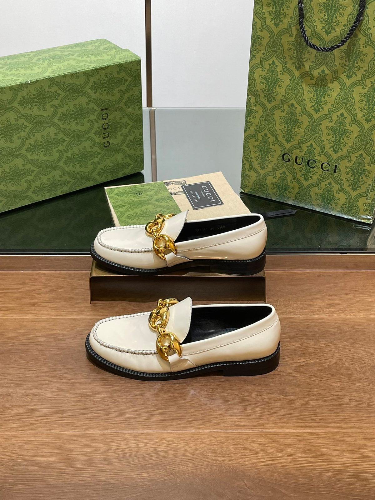 GG LOAFER SHOES IN WHITE CALFSKIN WITH GOLD HARDWARE