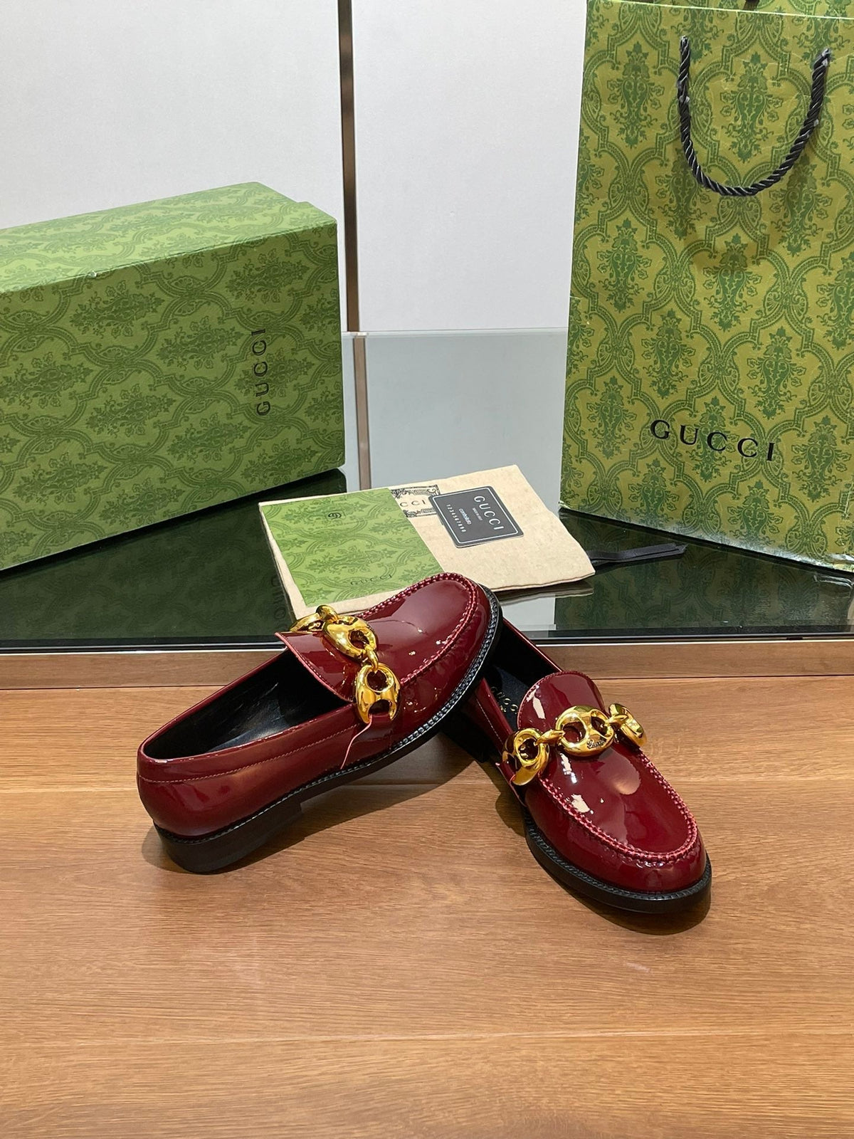 GG LOAFER SHOES IN BLOOD RED CALFSKIN WITH GOLD HARDWARE