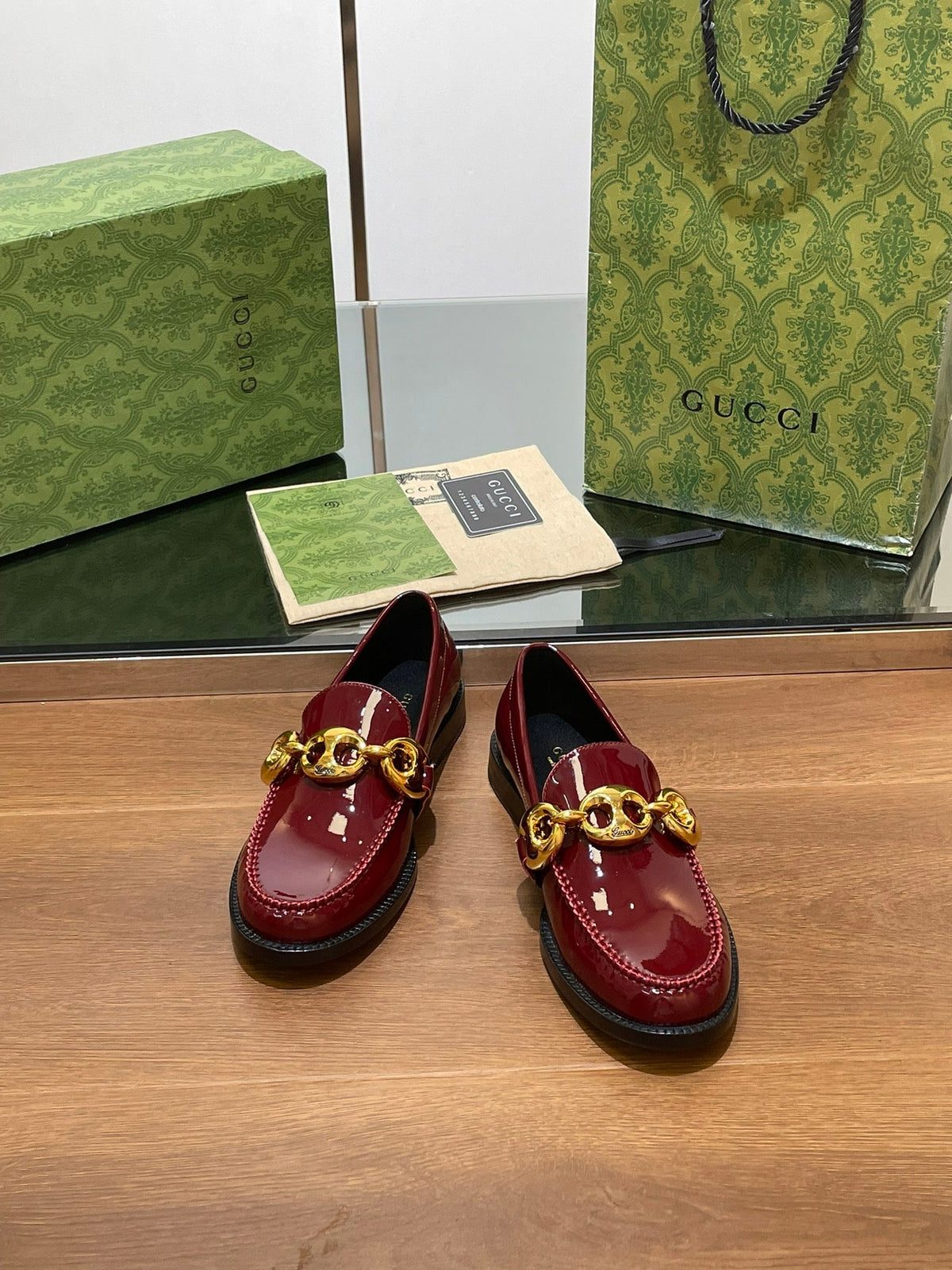GG LOAFER SHOES IN BLOOD RED CALFSKIN WITH GOLD HARDWARE