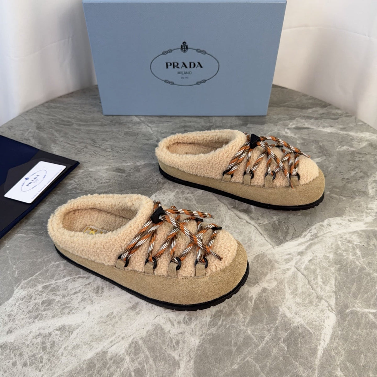 PRADA 26S WOVEN MULES IN BEIGE WOOL MIX SUEDE