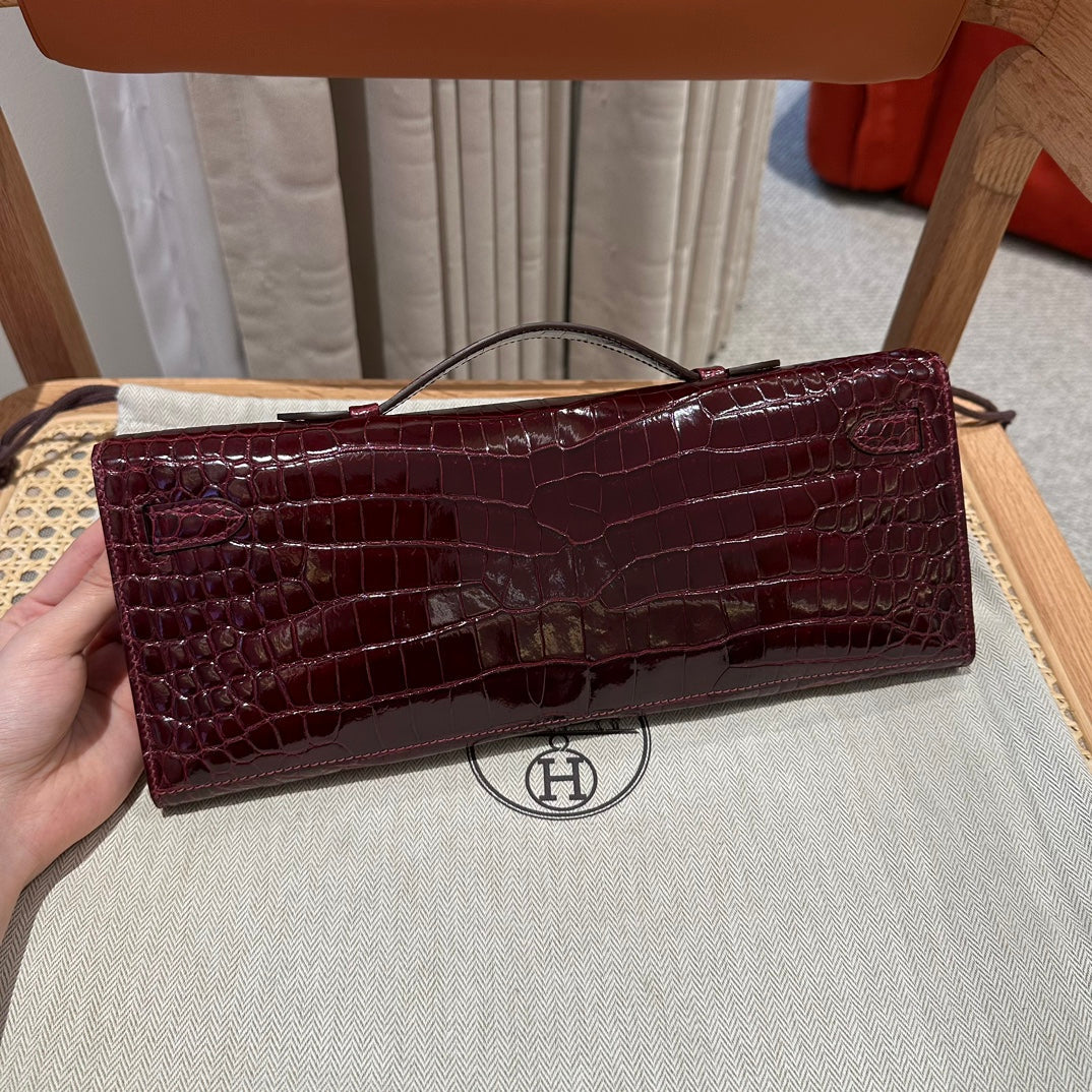 KELLY CUT 31 IN SANGRIA PURPLE ALLIGATOR LEATHER WITH GOLD HARDWARE