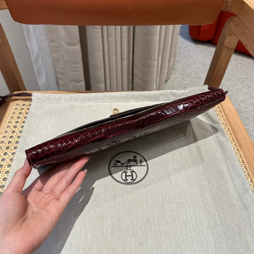 KELLY CUT 31 IN SANGRIA PURPLE ALLIGATOR LEATHER WITH GOLD HARDWARE