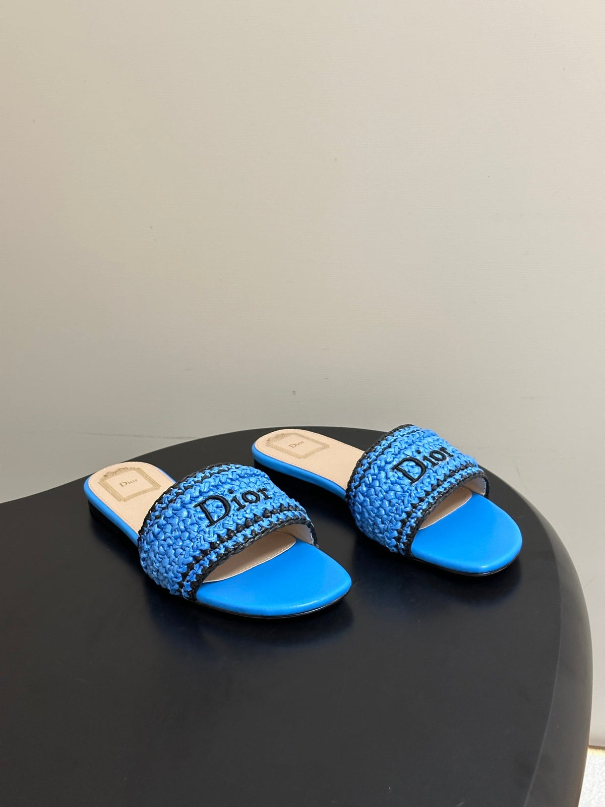 DIOR 26S FLAT SLIDE SANDALS IN BLUE RAFFIA