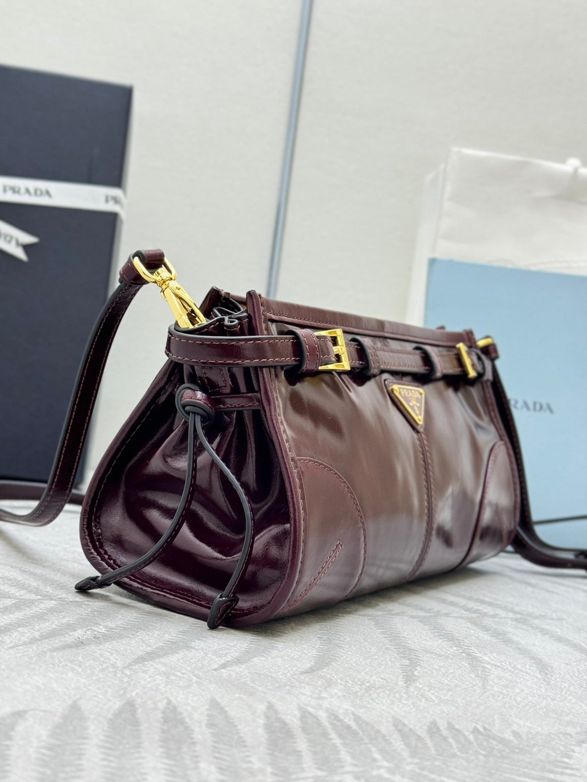 PRADA 25S BONNIE SMALL SHOULDER BAG 26 IN BURGUNDY GLOSSY CALFSKIN GOLD HARDWARE