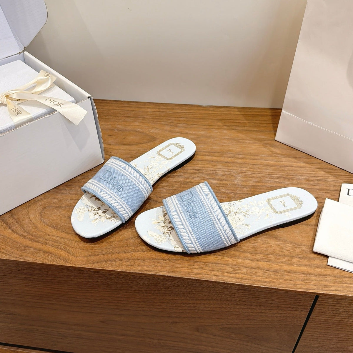 DIOR 26S FLAT SLIDE SANDALS IN LIGHT BLUE CANVAS