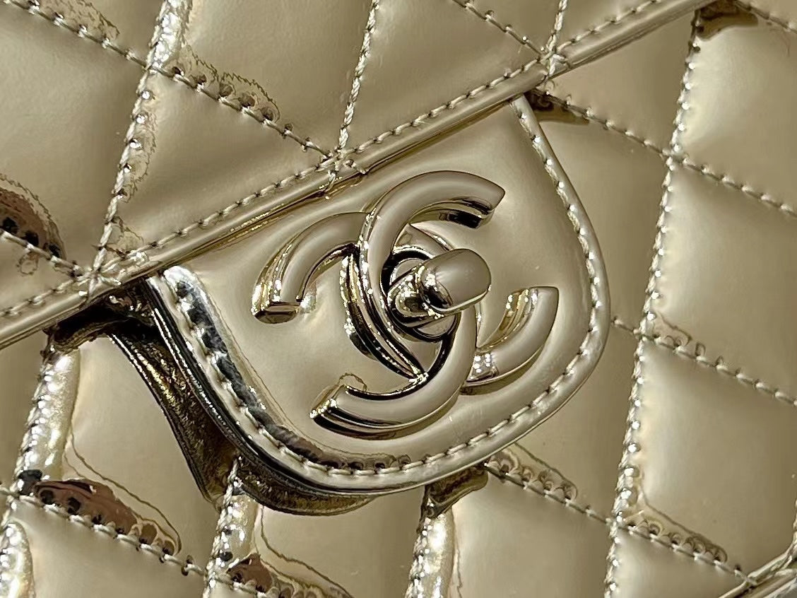 25S CHANEL STAR GOLD 23 IN METALLIC GOLD CALFSKIN