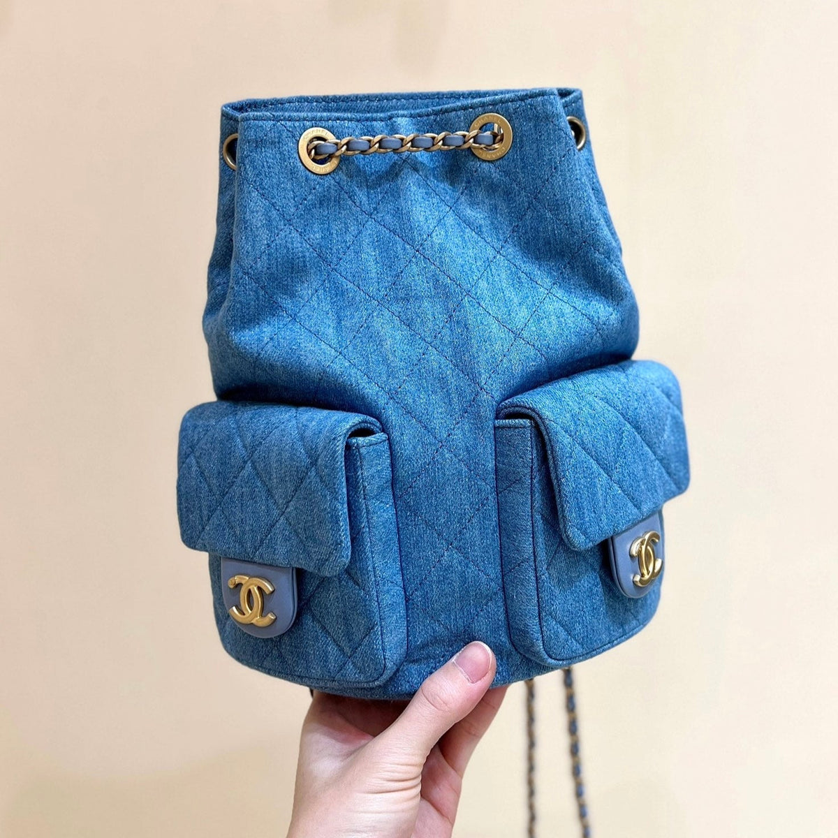 DRAWSTRING BUCKET BACKPACK 24 IN MALIBU BLUE DENIM GOLD HARDWARE