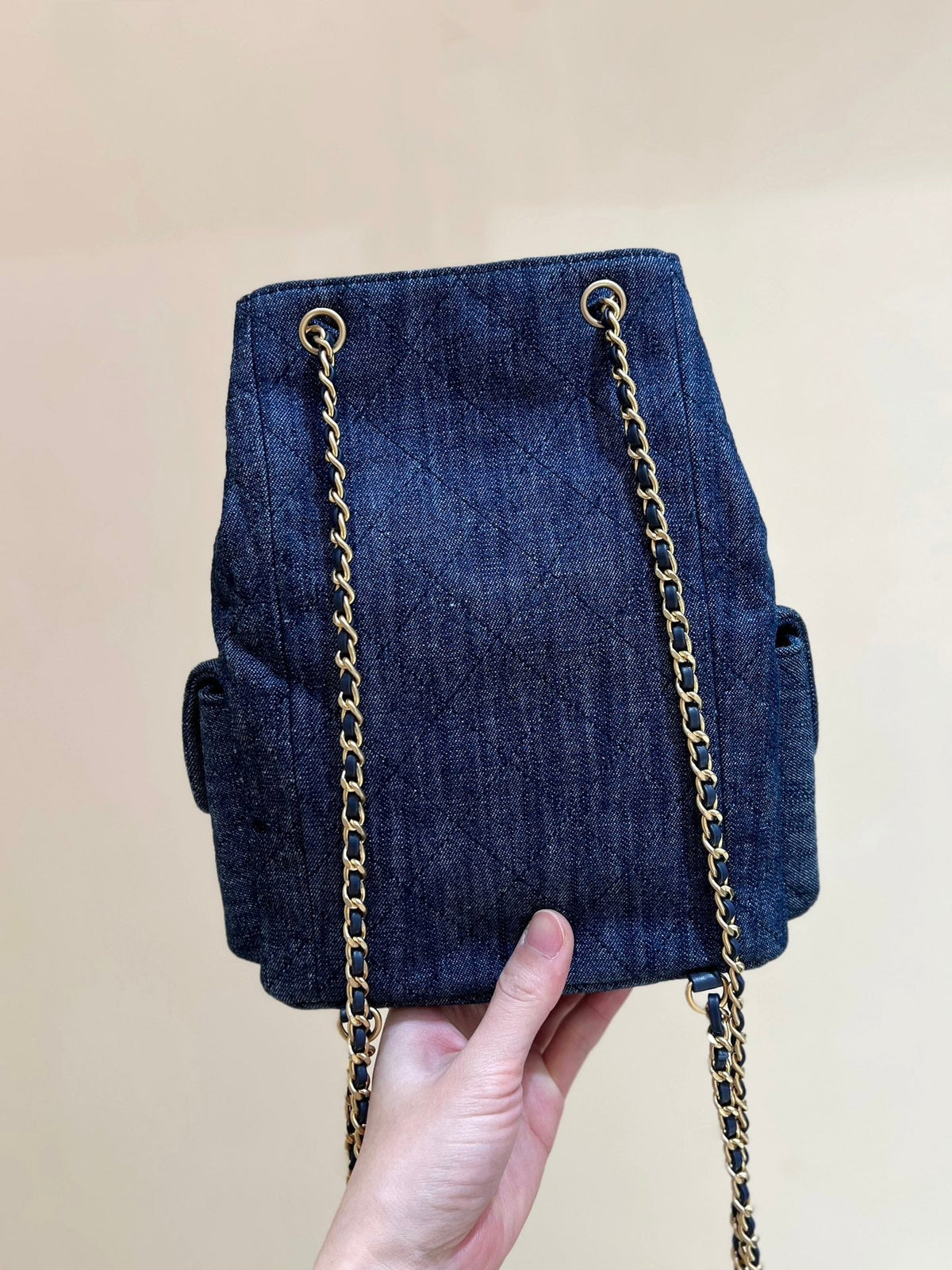 DRAWSTRING BUCKET BACKPACK 24 IN DARK BLUE DENIM GOLD HARDWARE