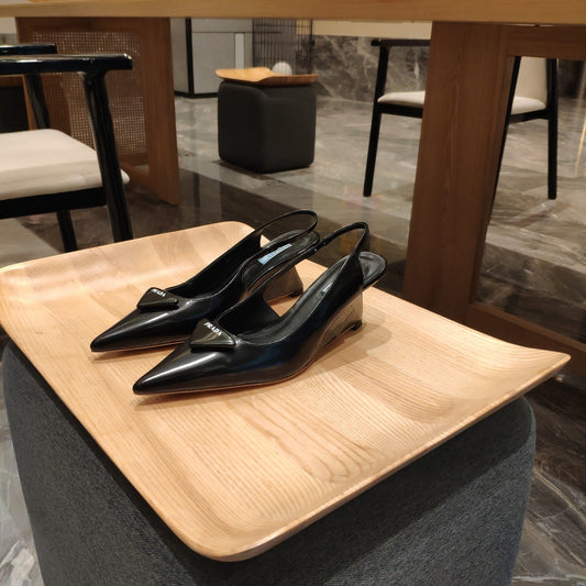 PRADA 26S POINTED TOE WEDGE SLINGBACK PUMPS IN BLACK CALFSKIN