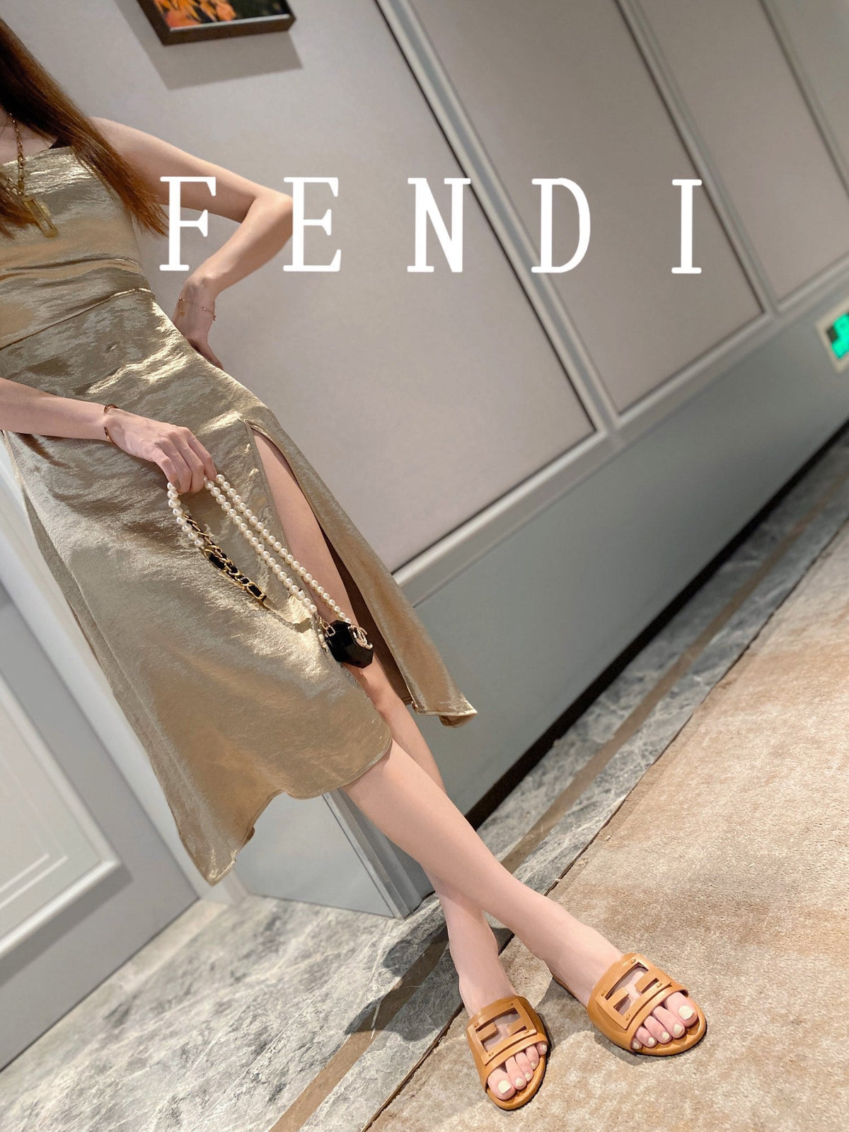 FENDI BAGUETTE SLIDES IN  COPPER BROWN LAMBSKIN