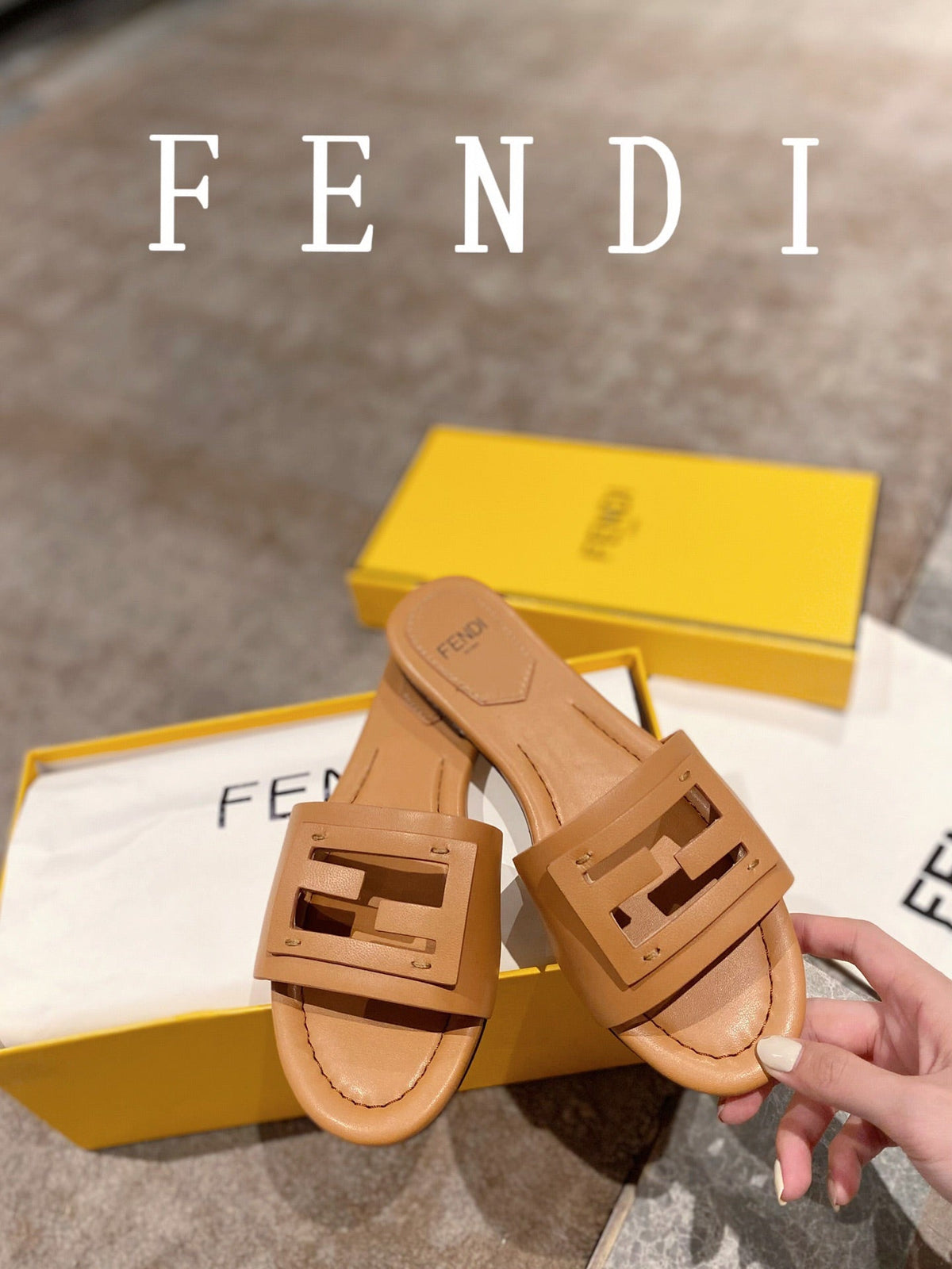 FENDI BAGUETTE SLIDES IN  COPPER BROWN LAMBSKIN