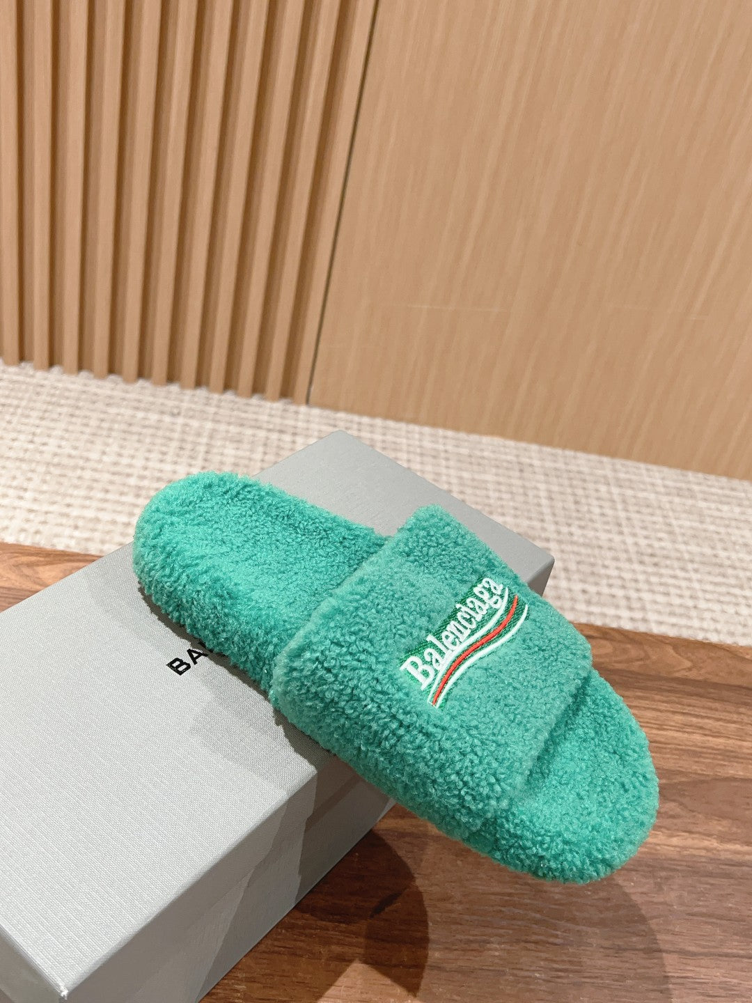 FURRY SLIDES IN TURQUOISE CURLY SHEARLING
