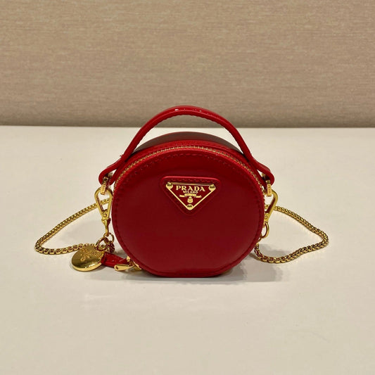 MINI ROUND BAG 8 IN RED GLOSSY CALFSKIN GOLD HARDWARE