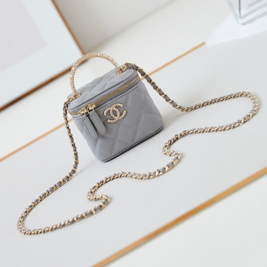 CHANEL 25S MINI VANITY BAG 11 CM IN GREY LAMBSKIN WITH CRYSTAL-EMBELLISHED CC LOGO