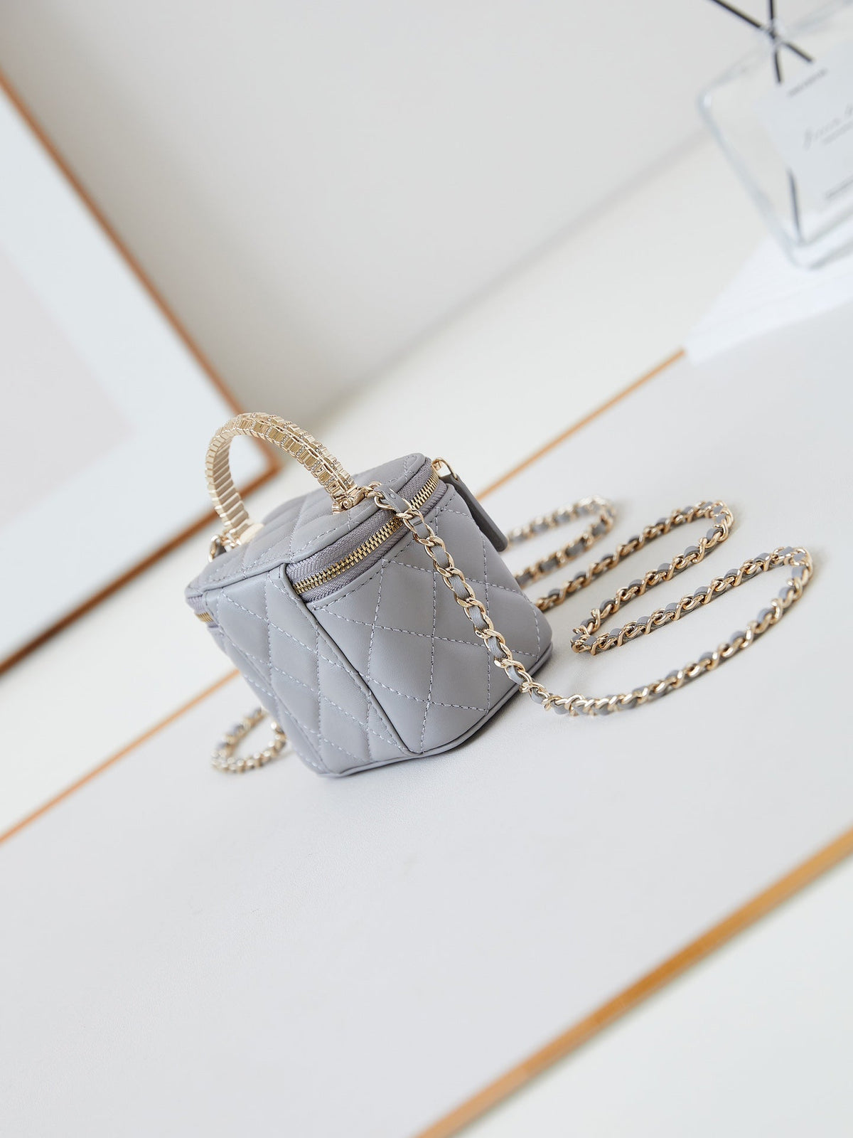 CHANEL 25S MINI VANITY BAG 11 CM IN GREY LAMBSKIN WITH CRYSTAL-EMBELLISHED CC LOGO