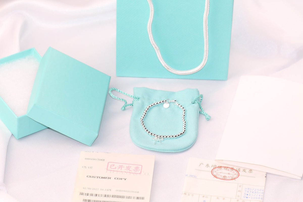 STERLING SILVER BOW BEAD BRACELET