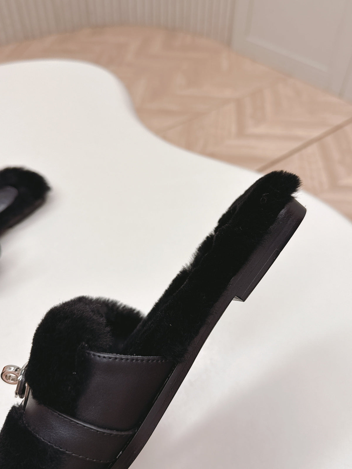 HM 25S ORAN SANDAL IN BLACK SHEARLING WITH SILVER HARDWARE