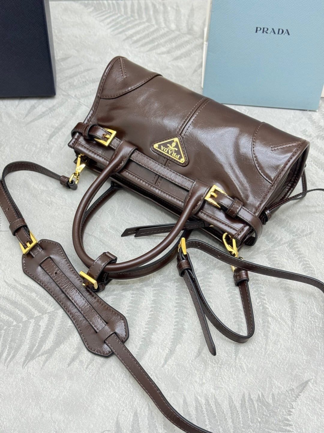 PRADA 25S BONNIE MINI HANDBAG 23 IN DARK BROWN CALFSKIN GOLD HARDWARE