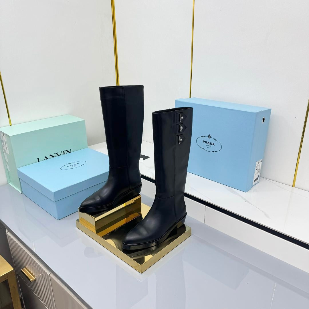 PRADA 25S CHUNKY SOLE TALL BOOTS MARTIN 50MM IN BLACK CALFSKIN