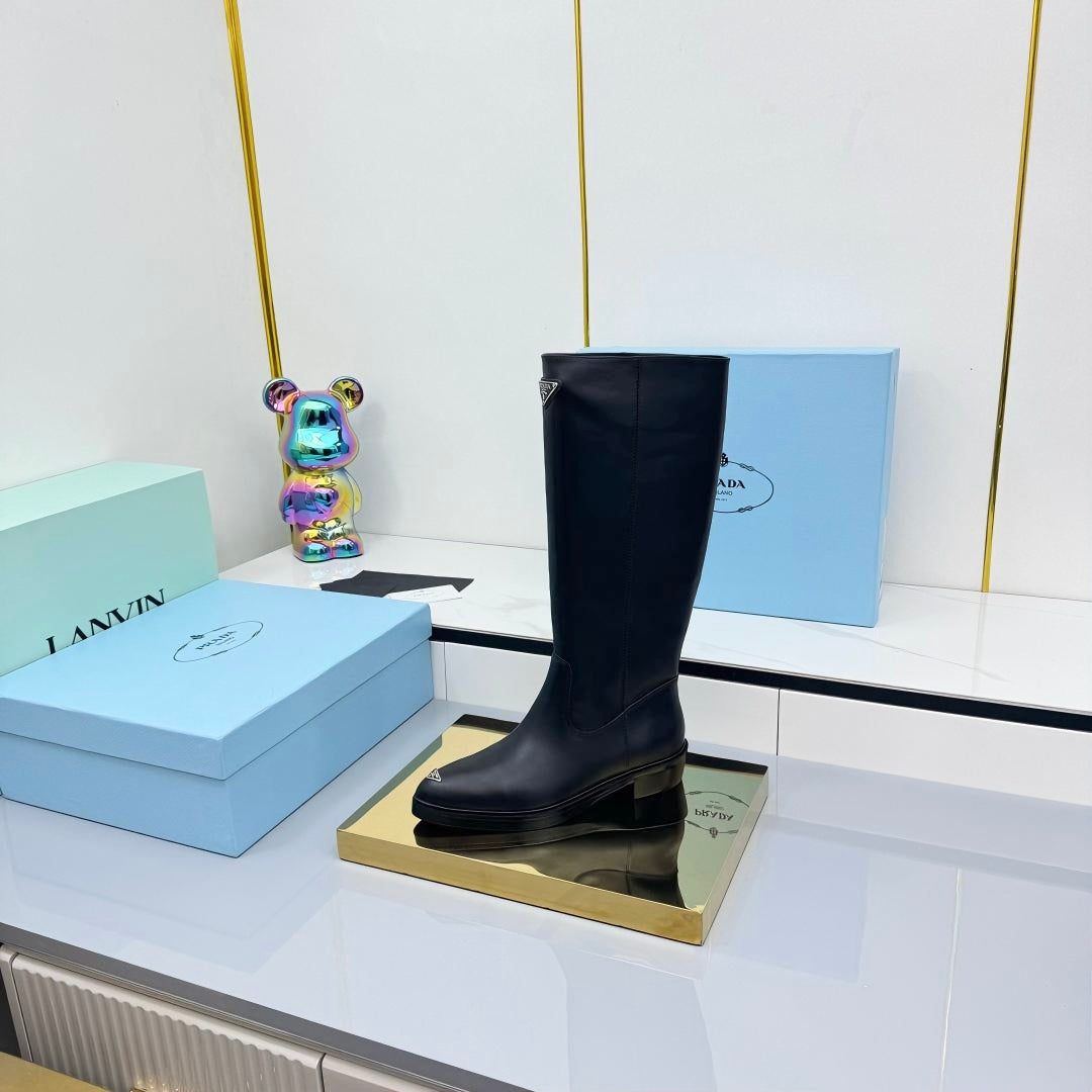 PRADA 25S POINTED TALL BOOTS 50MM IN BLACK CALFSKIN WITH LOGO