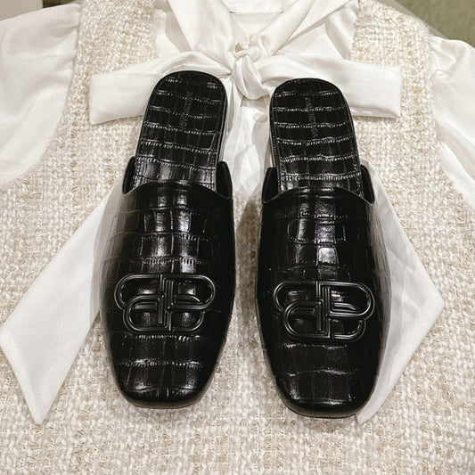 FLAT MULES IN BLACK CROCODILE EMBOSSED GLOSSY CALFSKIN