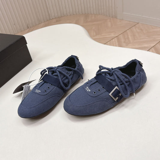 PRADA 26S LACE UP MINIMAL SNEAKERS IN NAVY BLUE CANVAS