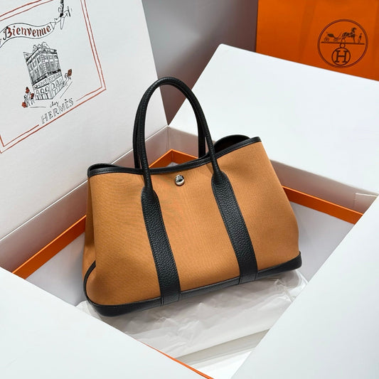 GARDEN PARTY 30CM IN ORANGE MINIMUM TOILETS COTTON CANVAS AND BLACK CALFSKIN