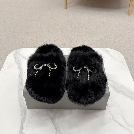 BALENCIAGA 25S SOFT FUR SLIPPERS IN BLACK FUR WITH RHINESTONE BOW