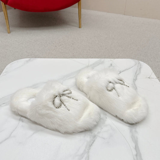BALENCIAGA 25S SOFT FUR SLIPPERS IN WHITE FUR WITH RHINESTONE BOW