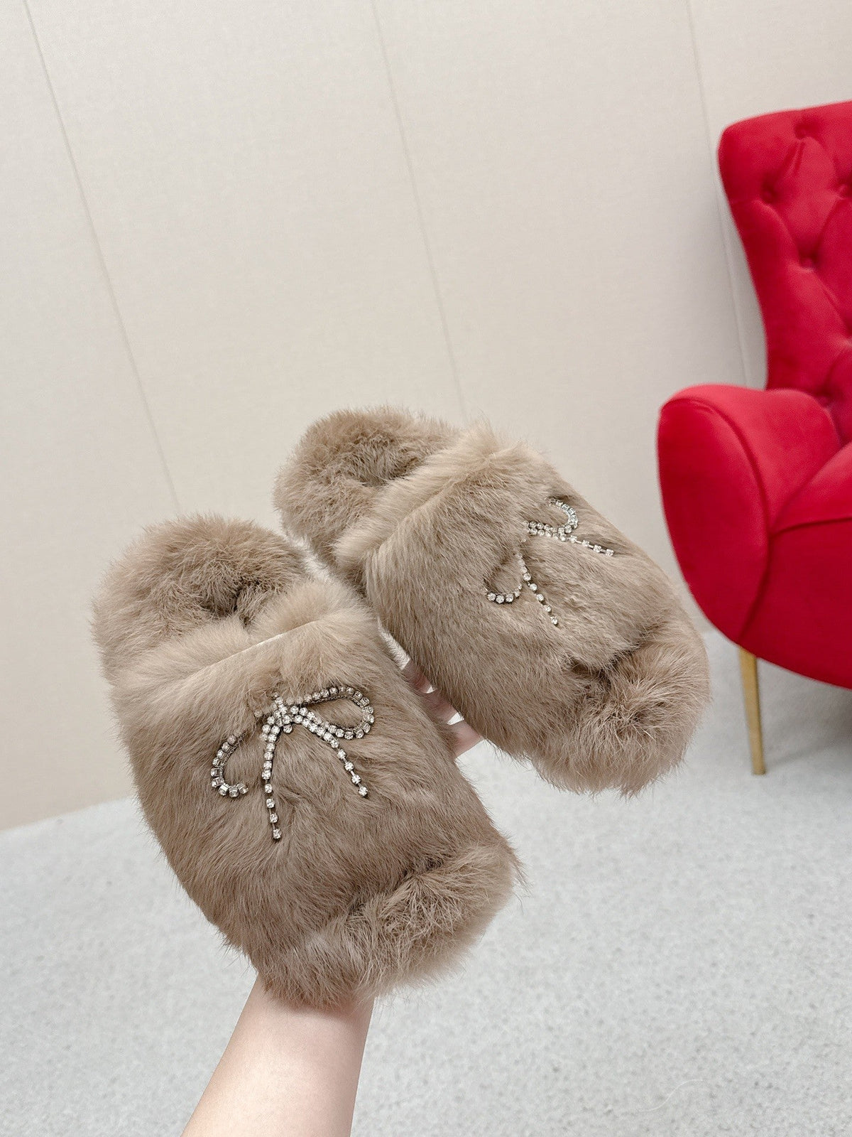 BALENCIAGA 25S SOFT FUR SLIPPERS IN LIGHT BROWN FUR WITH RHINESTONE BOW