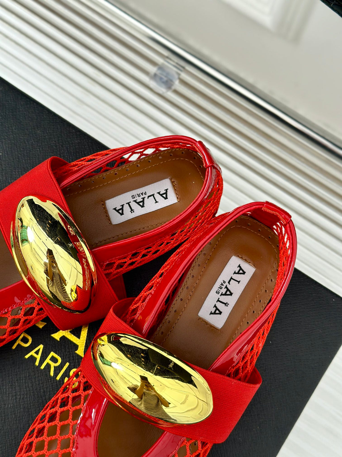 ALAIA MARY JANE SHOES IN CHERRY RED MESH WITH GOLD HARDWARE