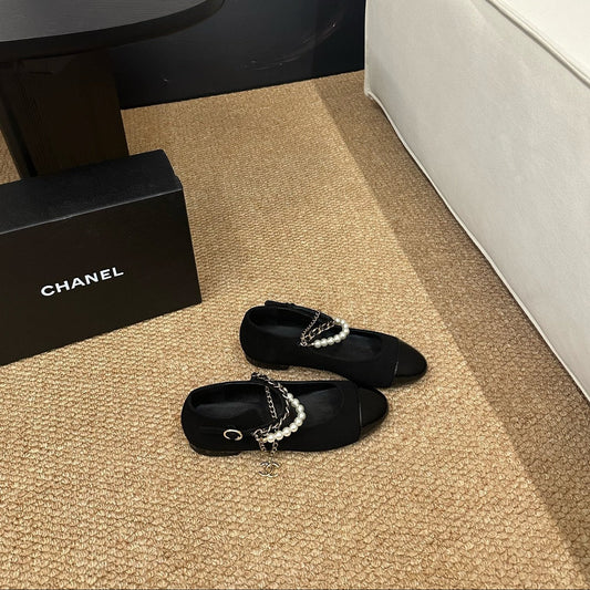 CHANEL 26S MARY JANE PEARL STRAP FLATS IN BLACK CALFSKIN