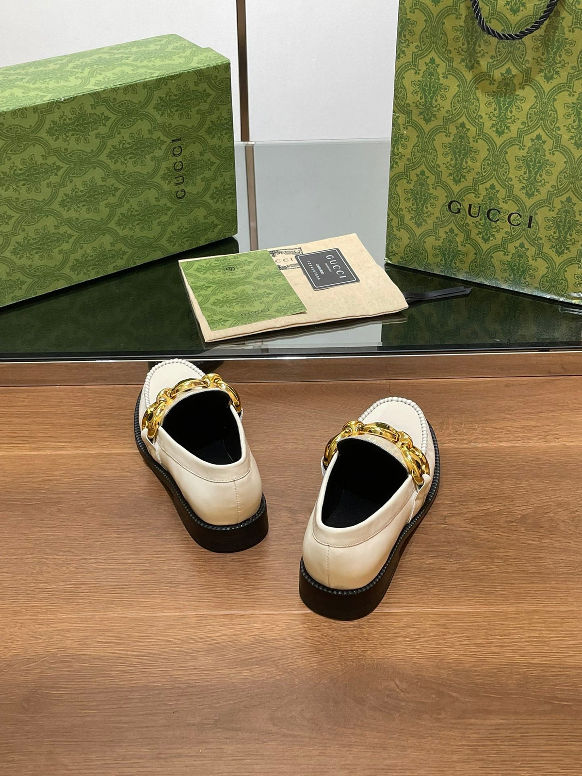 GG LOAFER SHOES IN WHITE CALFSKIN WITH GOLD HARDWARE