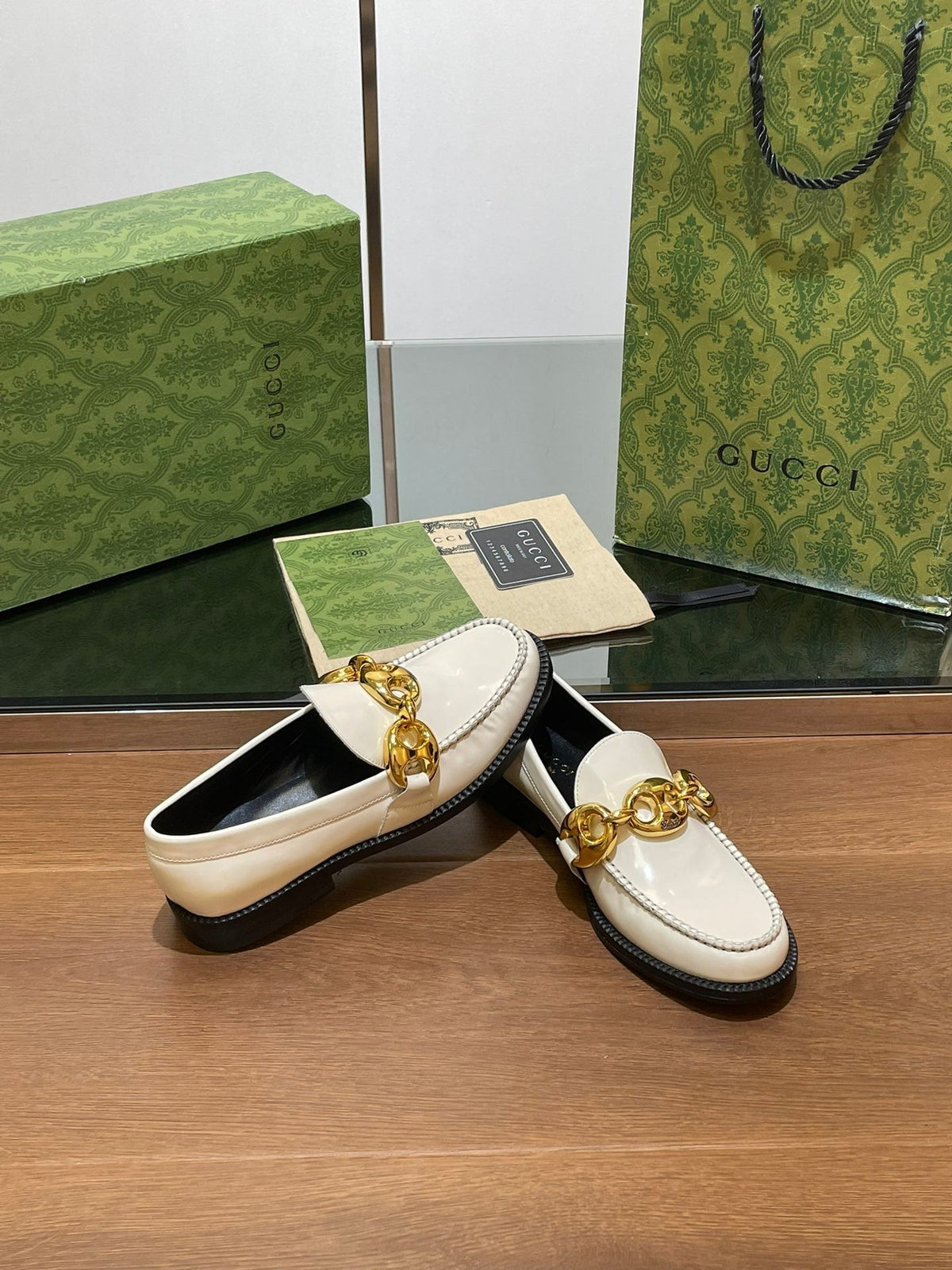 GG LOAFER SHOES IN WHITE CALFSKIN WITH GOLD HARDWARE