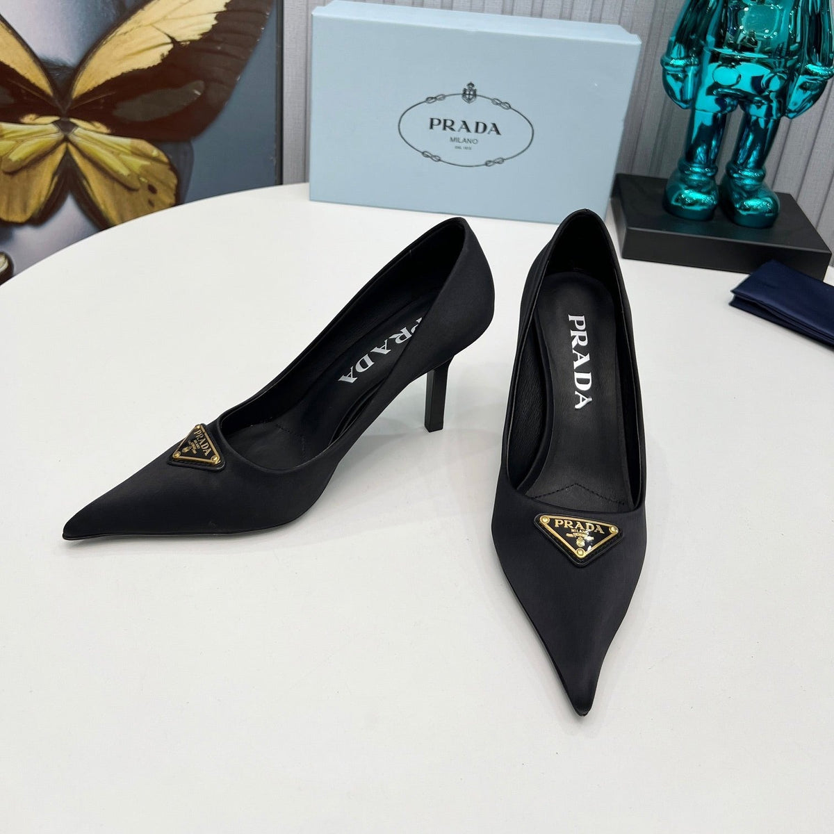 HIGH-HEEL PUMPS IN BLACK SATIN