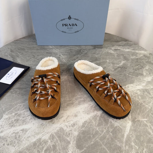 PRADA 26S WOVEN MULES IN COGNAC BROWN SUEDE