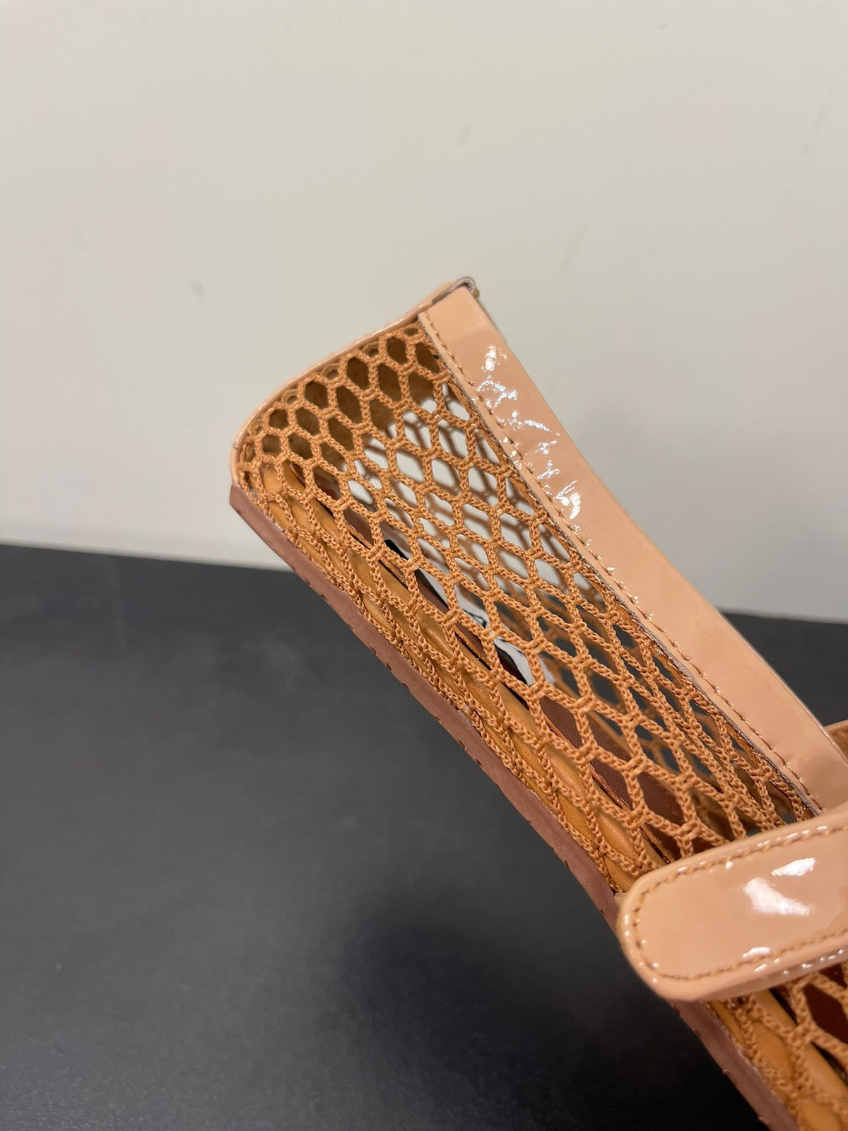 ALAIA BALLET FLATS IN COPPER BROWN MESH FISHNET