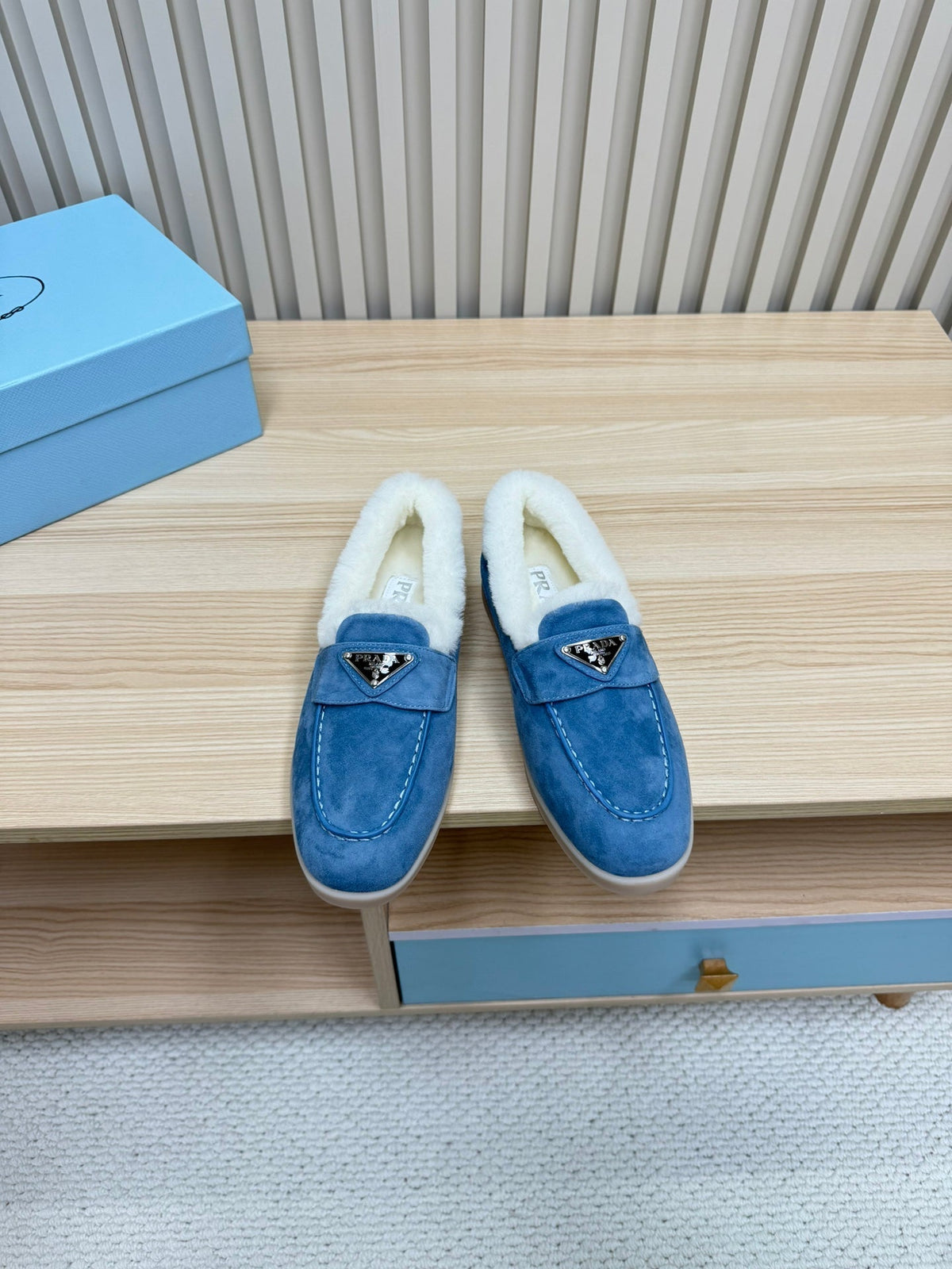 LOAFER IN AZURE BLUE SUEDE AND FUR LINING ATTACHED TRIANGLE LOGO
