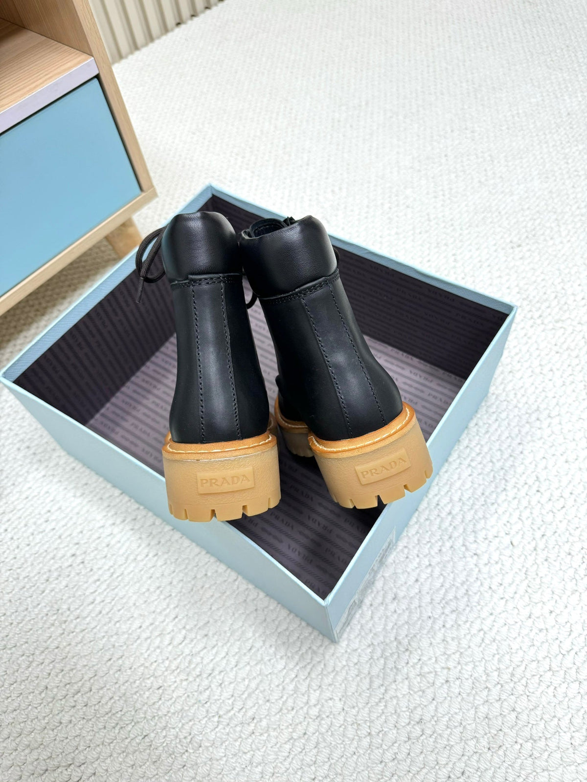 PRADA 25S LACE-UP ANKLE BOOTS IN BLACK CALFSKIN