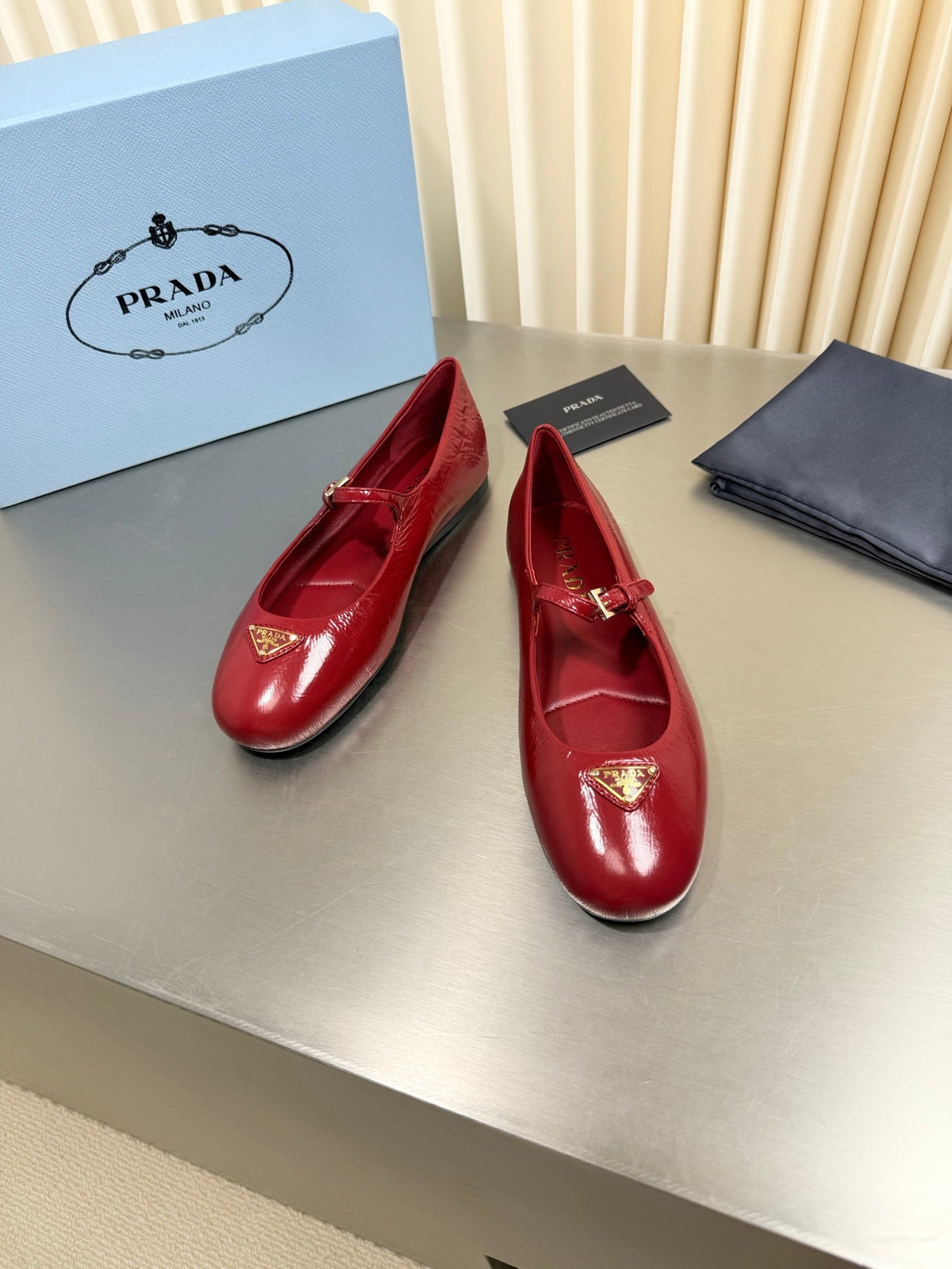 PRADA 26S MARY JANE FLATS IN RED CALFSKIN
